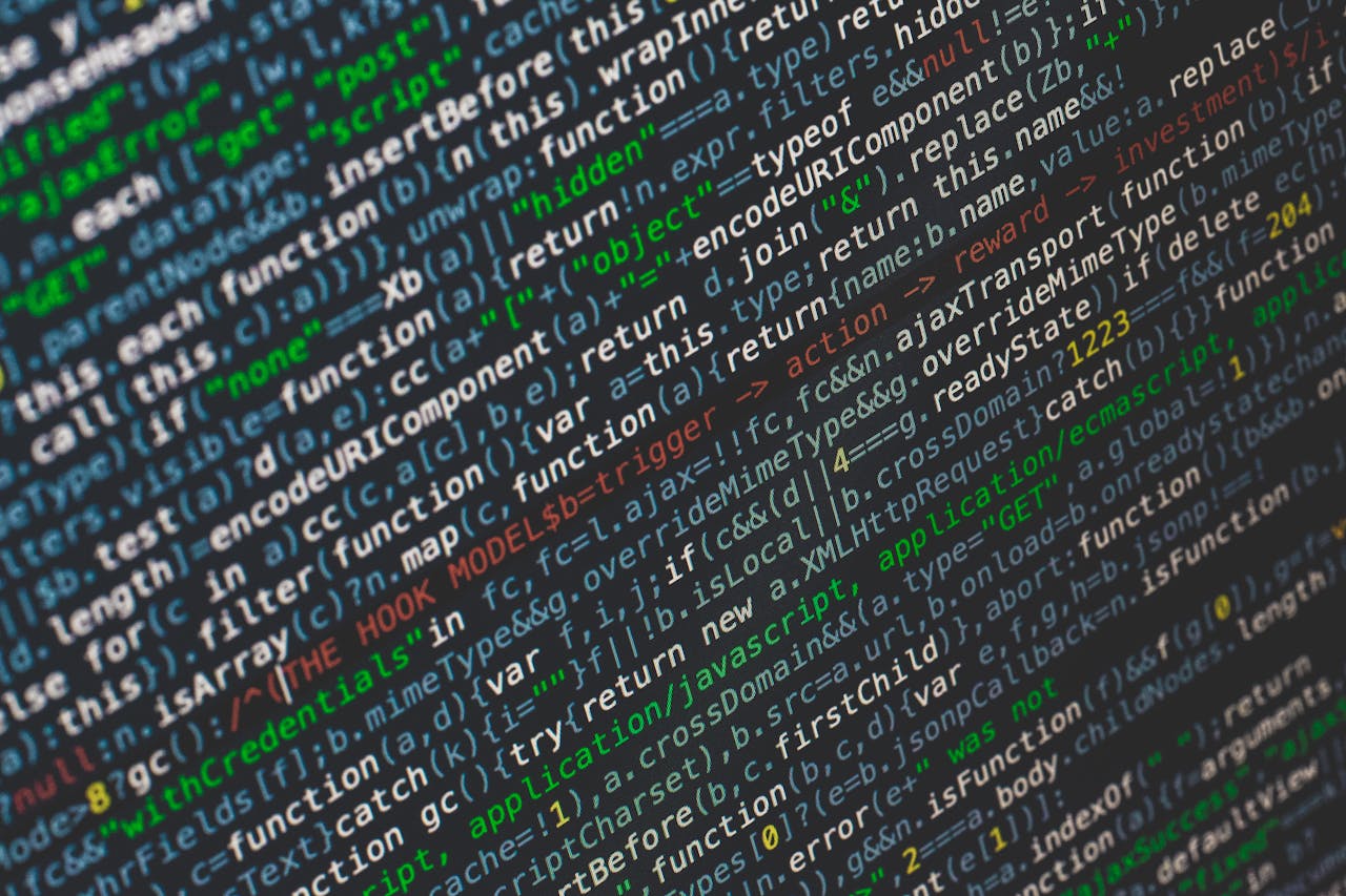 Close-up of colorful programming code displayed on a computer screen.